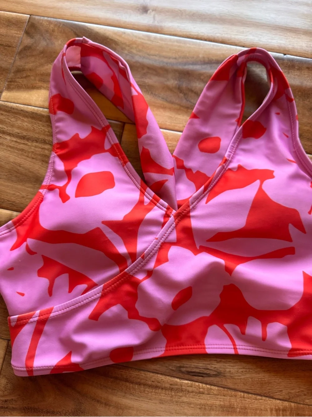 Nani Swimwear Pink and Red Abstract Sports Swim Top